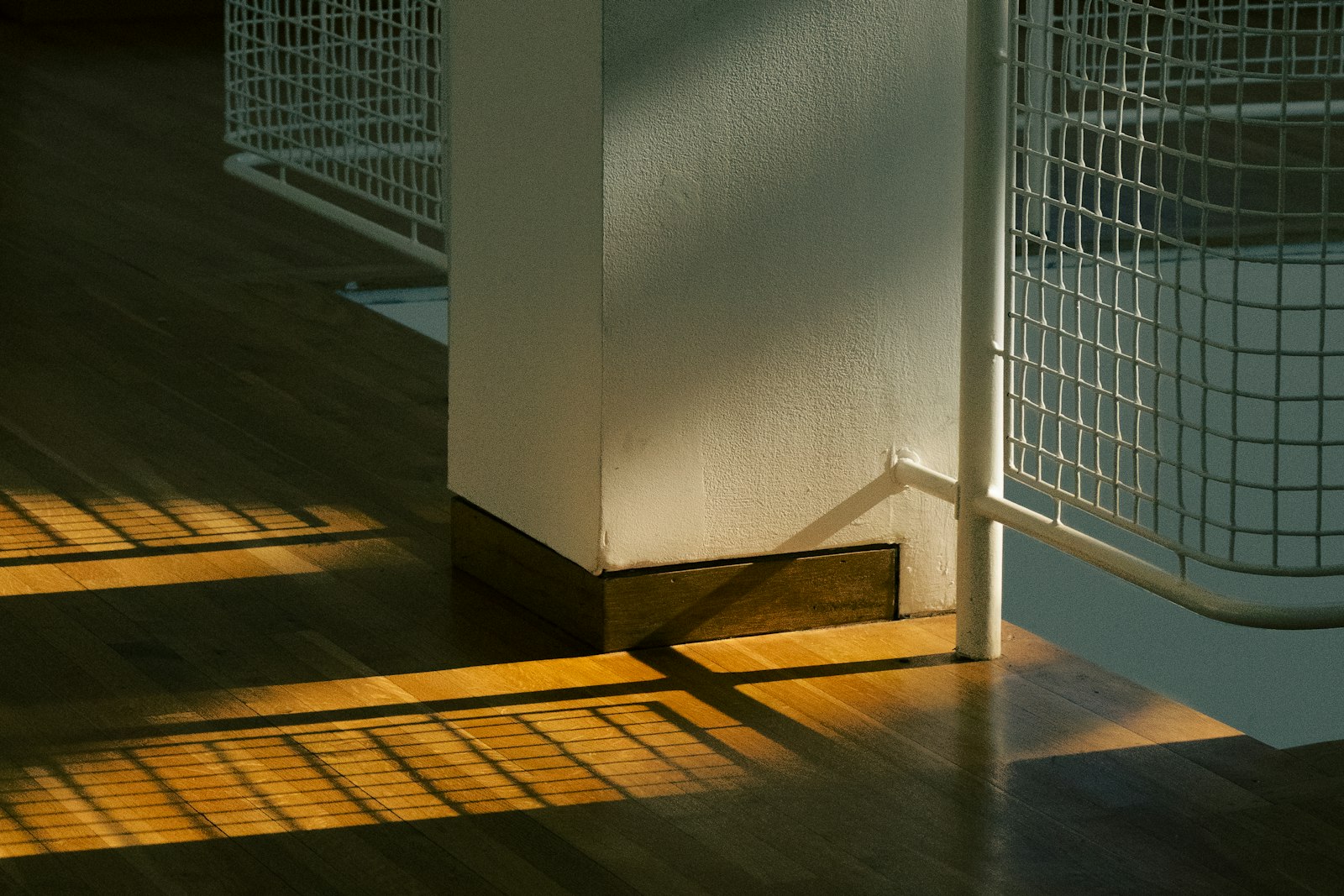 Longwater House — light across a timber floor